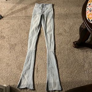 custom made stacked jeans with distressed bottoms